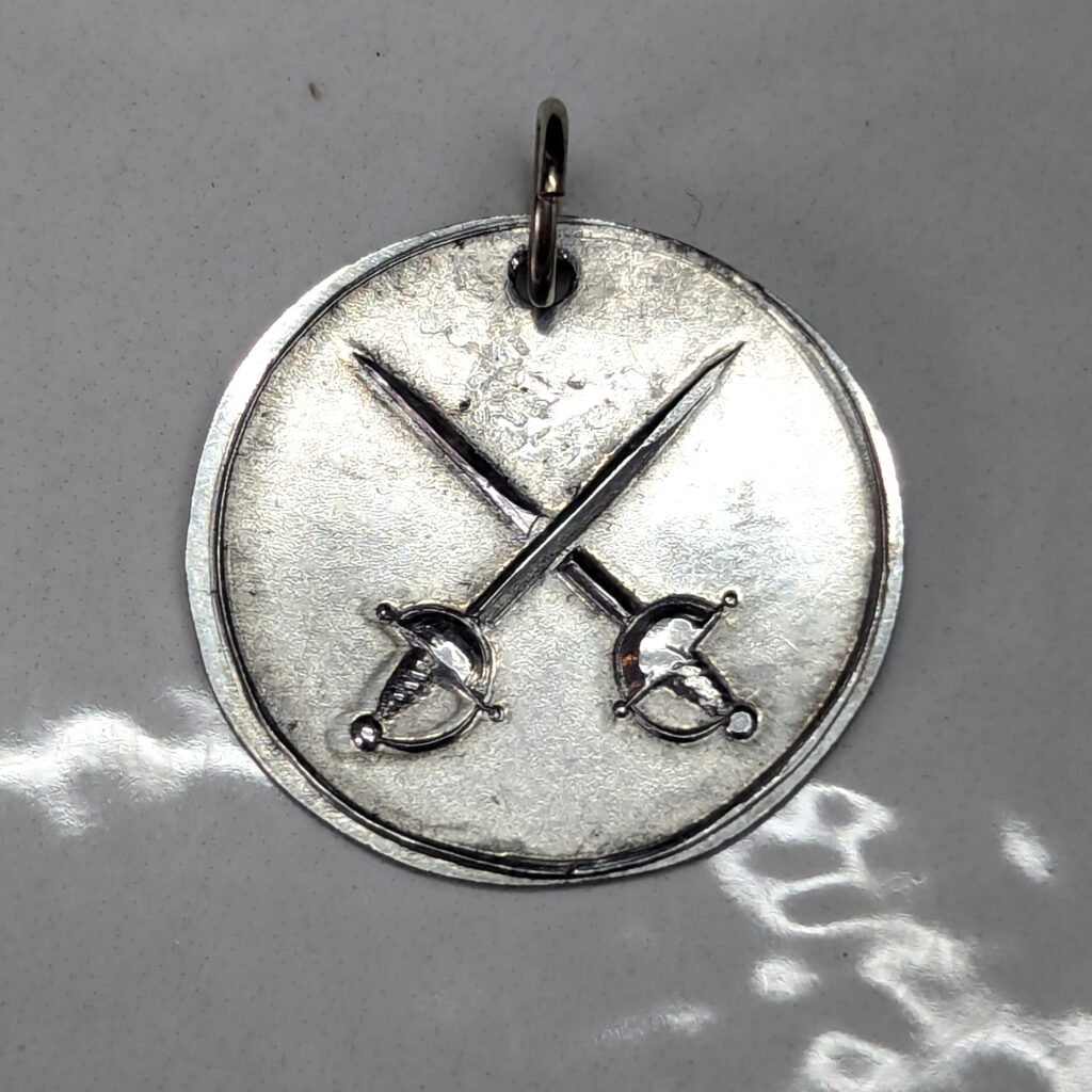 Fencing Marshal pendant