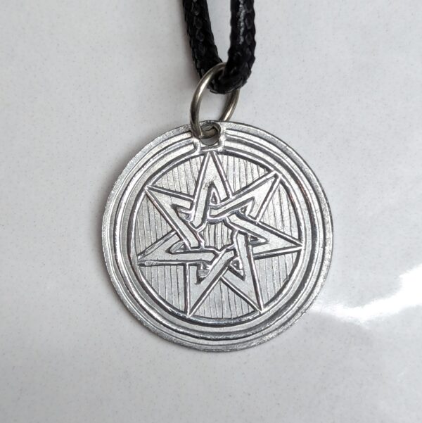 Order of the Crucible coin pendant