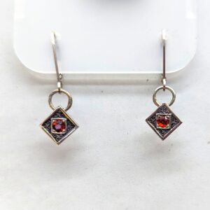 Garnet and Triskelion earrings on leaver backs